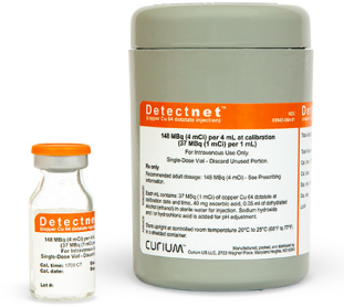 Single-dose vial of Detectnet next to a shielded (lead) container.