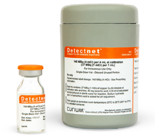 Single-dose vial of Detectnet next to a shielded (lead) container.